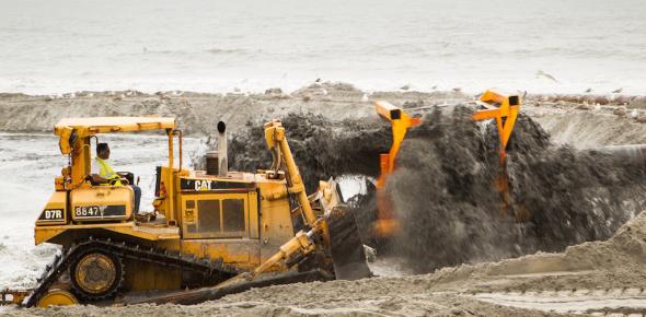 <p><strong>Fig. 2.24.</strong> The U.S. Army Corps of Engineers replenishes an Atlantic City beach with sand dredged from the ocean after the beach was eroded by Hurricane Sandy in the fall of 2012.</p>
