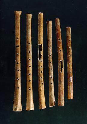 <p><strong>Fig. 5.43.</strong> (<strong>B</strong>) Flutes discovered in the Yellow River Valley, China. They are between 7,000 and 9,000 years old, made from wing bones of the red-crowned crane (<em>Grus japonensis</em>).</p>
