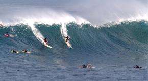 <p><strong>SF Fig. 5.1.</strong> Surfers ride a large wave at Waimea Bay, Hawai‘i</p>
