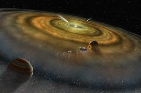 <p><strong>Fig. 7.2.</strong> An artist’s conception of dust and gas cloud surrounding a young solar system</p>