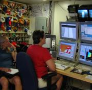 <p><strong>Fig. 2.7.</strong> (<strong>A</strong>) Scientists aboard the National Oceanic and Atmospheric Association (NOAA) Ship <em>Thomas Jefferson</em> use computers to monitor and analyze SONAR data.</p>