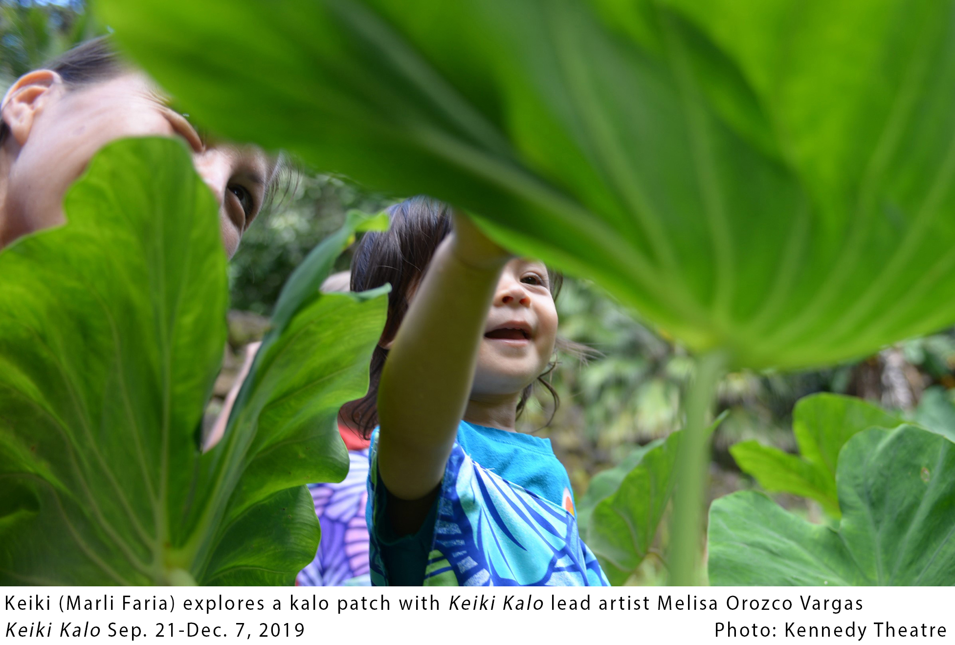 Keiki (Marli Faria) explores a kalo patch with Keiki Kalo lead artist Melisa Orozco Vargas. Keiki Kalo Sep 21-Dec 7, 2019