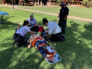 Hands-on session with MICT students. Because of COVID-19 precautions, students are doing their clinical training outdoors, weather-permitting.