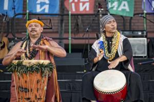 KCC Professor Kawika Napoleon and Okinawa's Daiichi Hirata perform at the 2012 Eisa Festival.