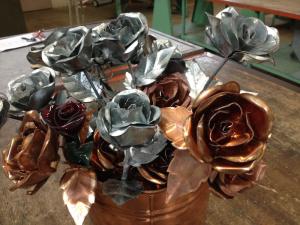 Sheet metal and copper roses on sale 2/14.