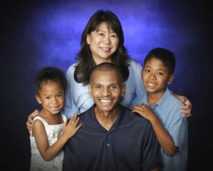 Alison Brown-Carvalho, with late husband William Brown and children Miya and Donovan.