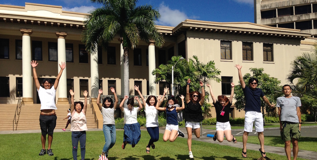 HELP students jumping in front of Hawaii Hall