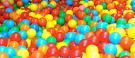 Large number of color balls in a confined area to illustrate density  