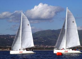 <p><strong>SF Fig. 5.2.</strong> The U.S. sailing team jockeys for position and tries to find the best wind during the 6th race of the 3rd World Military Games sailing competition in Sicily, 2003.</p>
