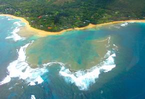 <p><strong>Fig. 7.26.</strong> An example of a fringing reef off the Nā pali coastline on Kaua‘i, Hawai‘i</p>
