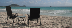Image of chairs on a beach to represent matter