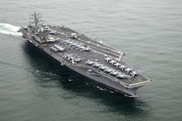 <p><strong>SF Fig. 2.4.</strong> A U.S. Navy Nimitz-class aircraft carrier floating at sea.</p>
