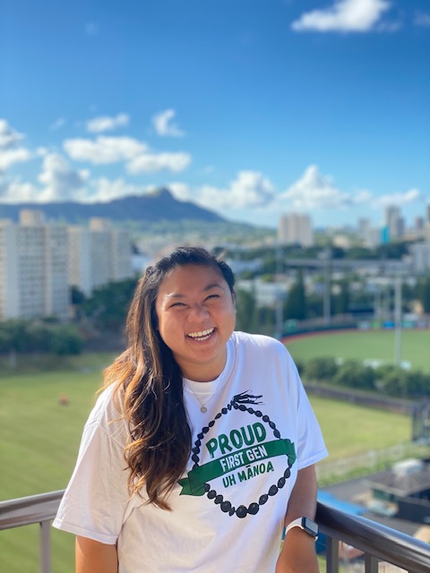 student at UH Manoa campus with Diamond Head background