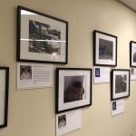 First set of framed photos of people and neighborhoods