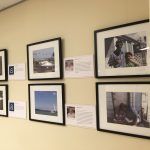 Second set of framed photos of people and neighborhoods
