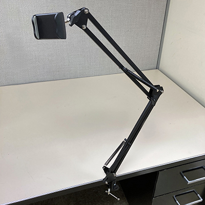 Image of desk arm mount installed