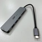 Image of USB-C multiport adaptor, which allows connections to USB-B, HDMI, and SD cards