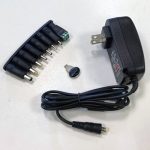 Adaptor with AC/DC switch and various plugs