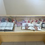 Miree Ya Kugani Exhibit: Display case with books