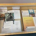 From Okinawa to Hawaiʻi and Beyond Exhibit - Various books with one titled The Okinawan Diaspora in Japan