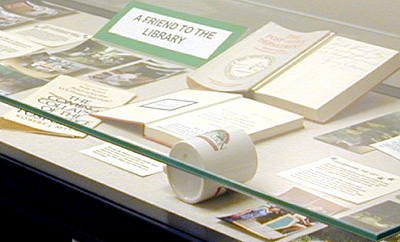 Display case with materials for Hiram Fong's support of education
