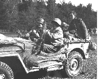 Two members of the Free French acting as guides for the Japanese Combat Team in France