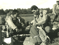Soldiers wait for transportation