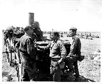 Soldiers inspect German field kitchen