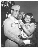 Returning soldier receives a lei
