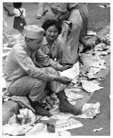 Soldier examines his discharge papers