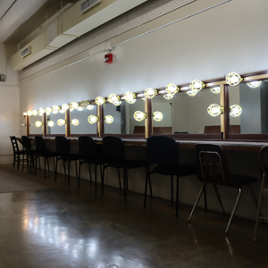 Dressing room make up mirror, counter and chairs