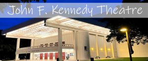 Exterior photo of Kennedy Theatre at dusk with exterior lights on, text overlay: John F. Kennedy Theatre