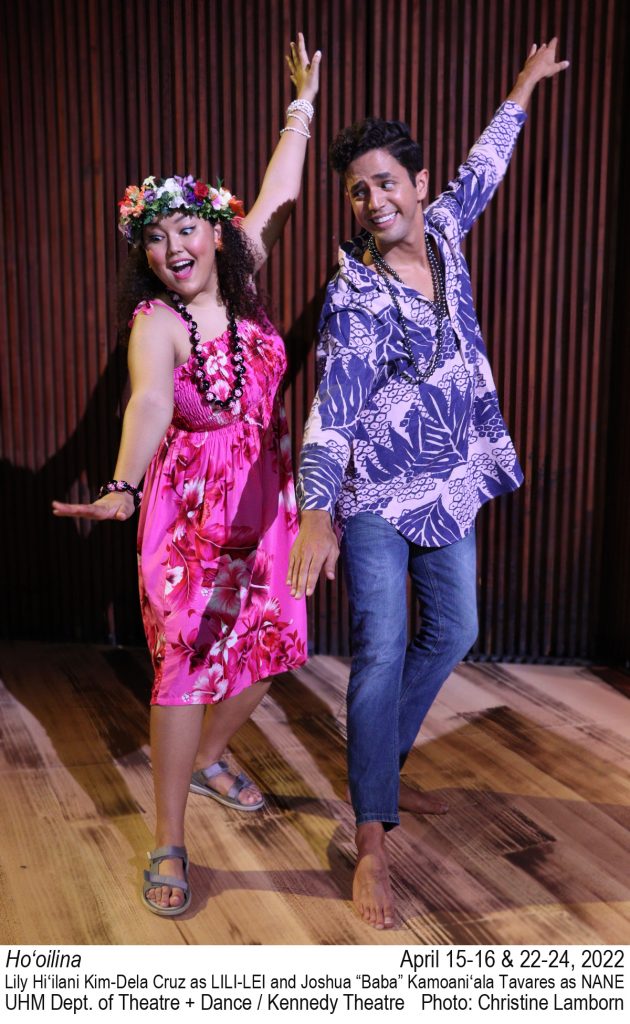 College actor in inauthentic Hawaiian themed apparel looks excited attempting to learn hula, while the college actor on the side looks uncomfortable.