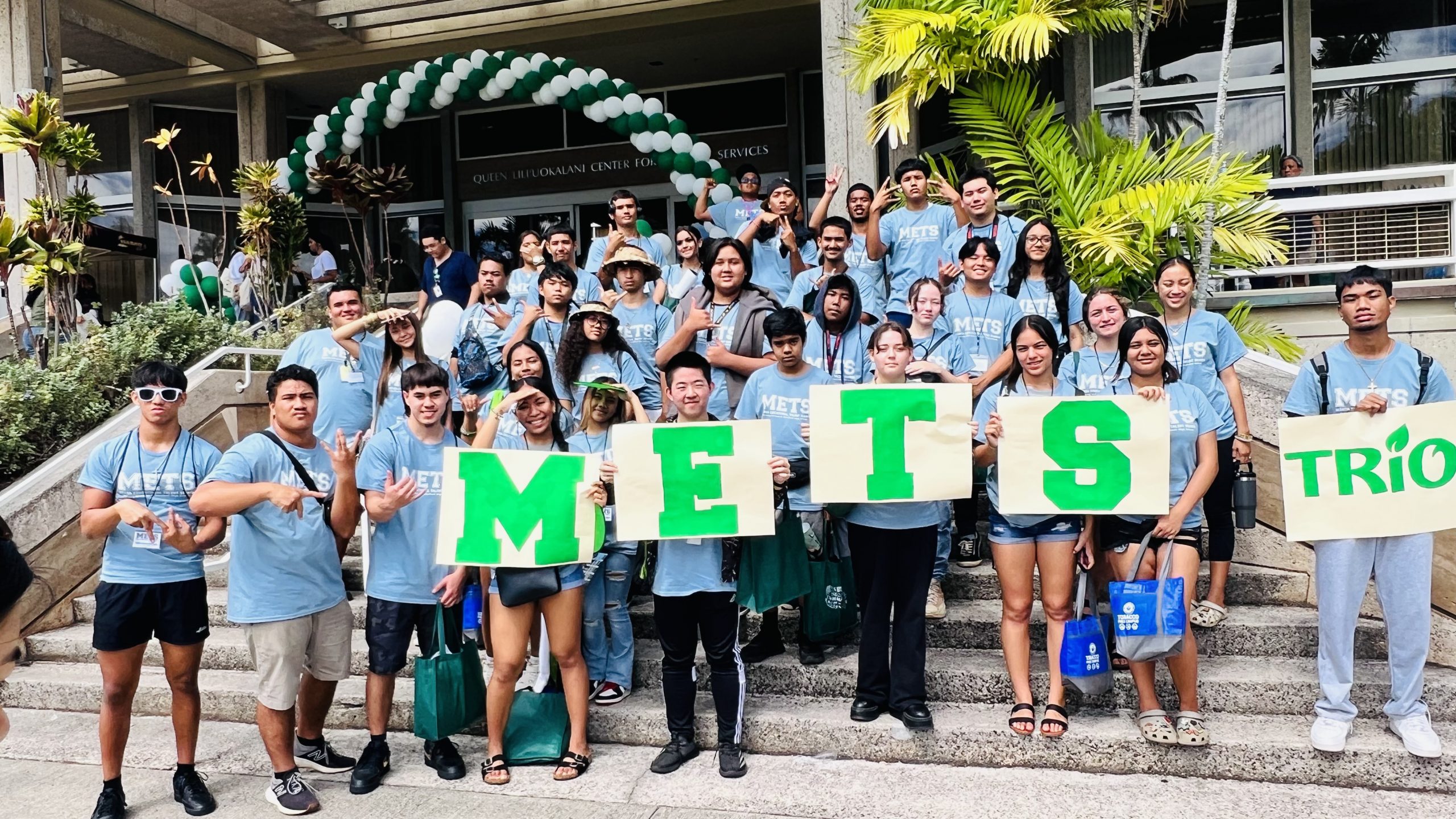 TRIO METS students in front of the QLC Student Services building