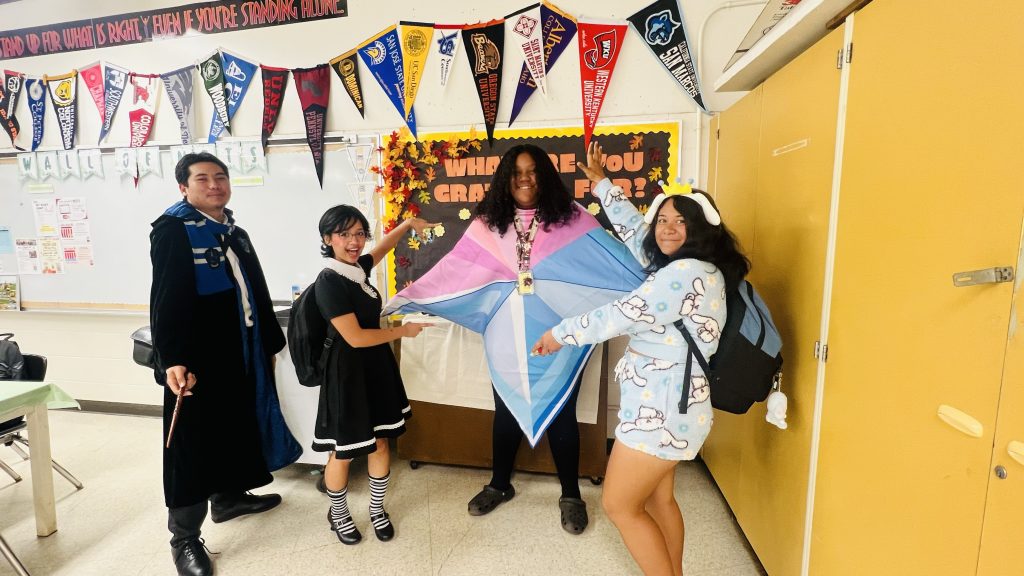 NHIS METS students in Halloween Costumes pose for a picture.