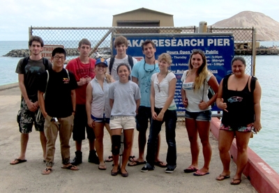 Students on a research pier