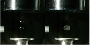 Levitating droplets of acidic and basic solutions merge into a larger droplet, in which carbon dioxide bubbles form as a product of the reaction.
