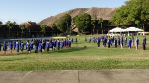 About 100 faculty and staff participated in the ceremony