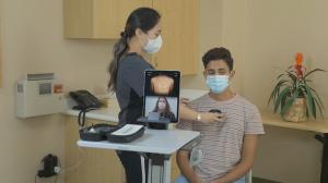 Telehealth equipment expands access to healthcare by connecting a student with a nurse practitioner.