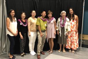 Madison Kim (far right) poses for photo with Virginia Hinshaw (2nd from right) and other attendees.