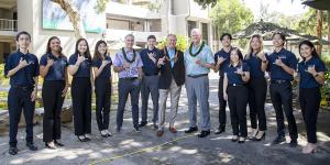 Jay Shidler and Dean Vance Roley with business students