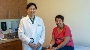 Dr. Naoto Ueno with patient
