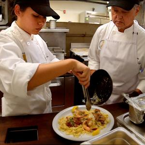 Alan Fujimoto (right) at Hawaiʻi CC
