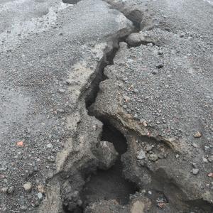 Large cracks rip through sections of Maunakea Access Road. 