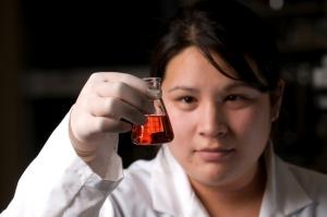 JABSOM Masters in Science student Brittany Sato in Dr. Abby Collier's lab at the UH medical school.