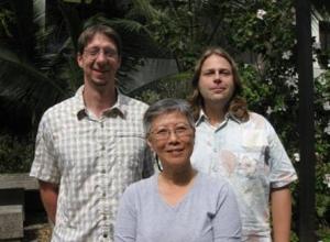 Drs. Catherine Chan-Halbrendt in front, with Creighton Litton and Christopher Lepczyk in back.