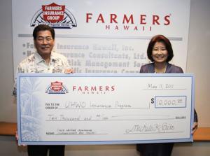 Gene Awakuni, chancellor, UH West O‘ahu; Michelle Saito, president, Farmers Insurance Hawaii