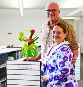 WCC alum Barbara Kahana with Chancellor Dykstra and her chosen donated bookshelf.