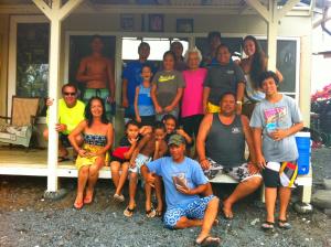 The Ahu family in Miloli`i, with Janna standing on porch at right near pillar.