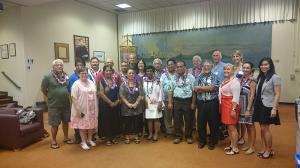 Pacific island judges join staff for a photo in the UH Law Library.